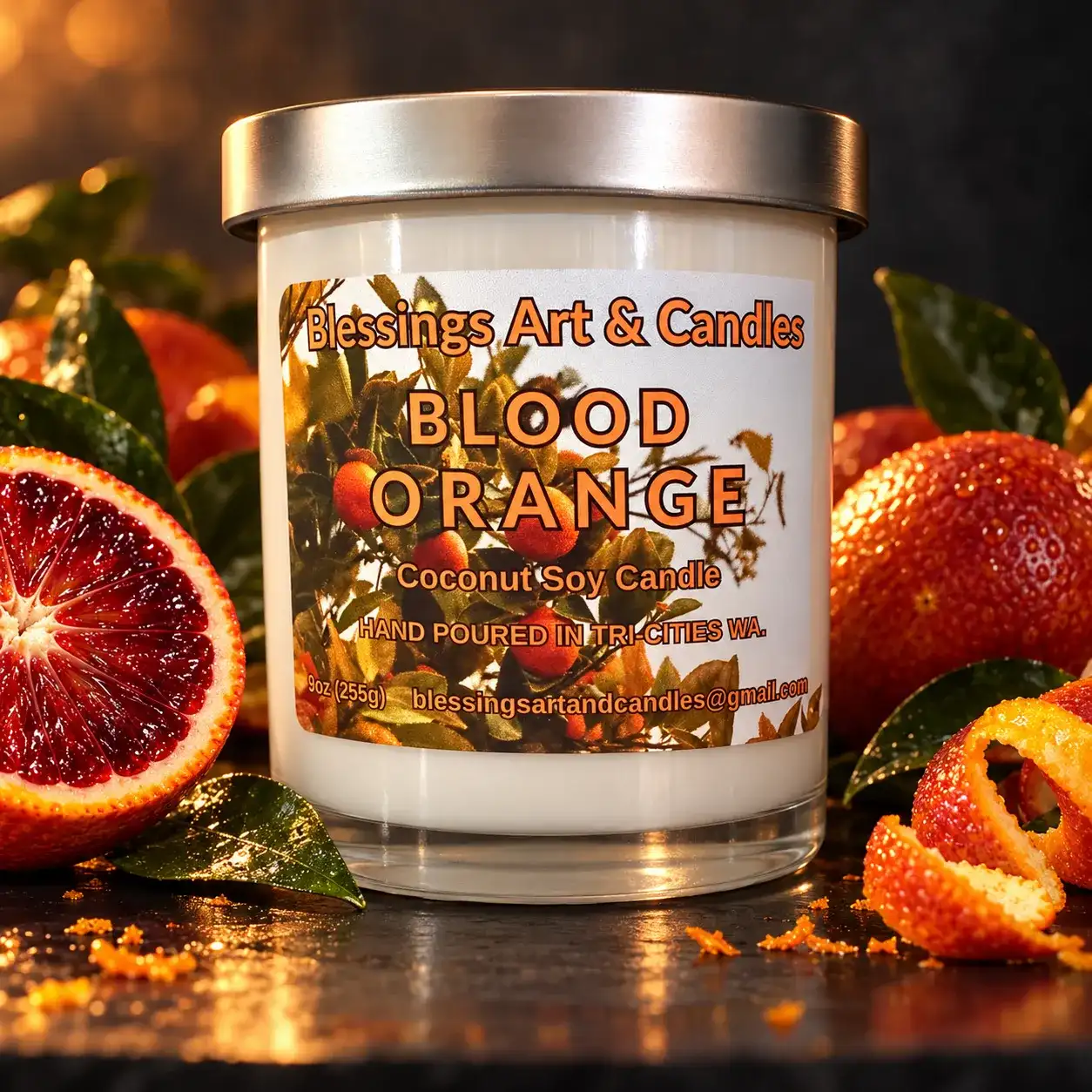 Blood Orange candle in a glass jar with sliced blood oranges around it
