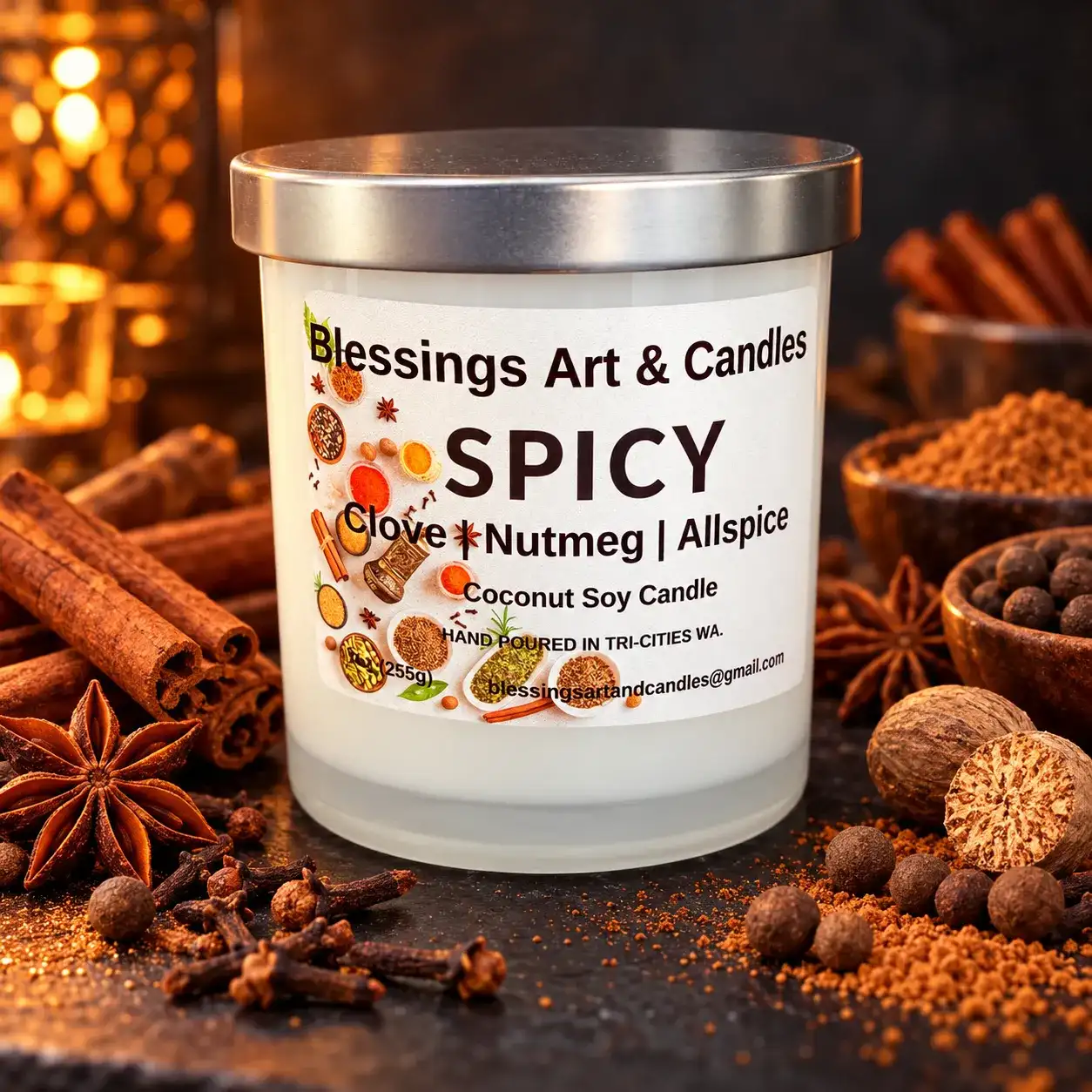 Spicy candle in a glass jar with cinnamon sticks, cloves and star anise