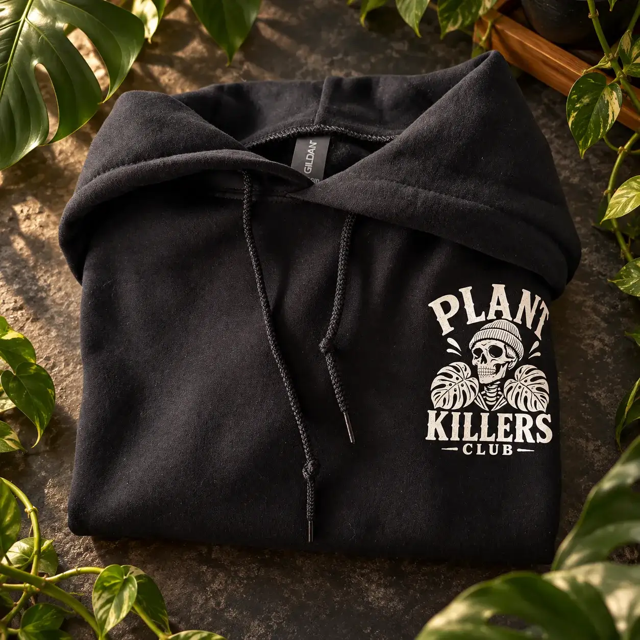 Black Plant Killers Club hoodie with a small cream chest print