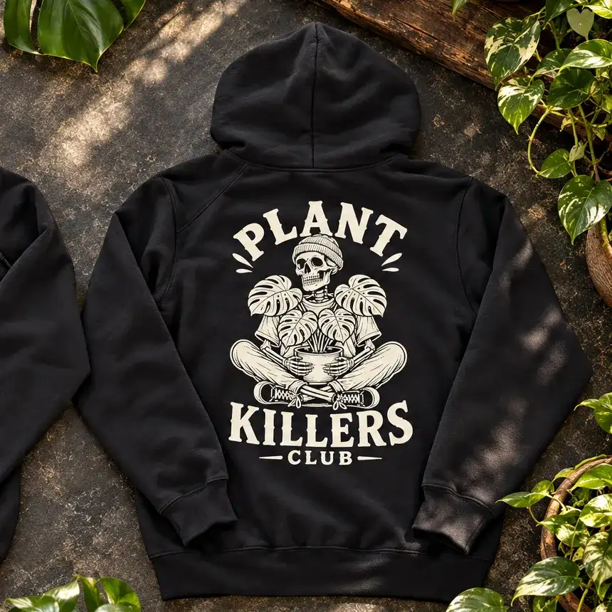 Back of the black Plant Killers Club zip-up hoodie: the full cream skeleton and monstera print