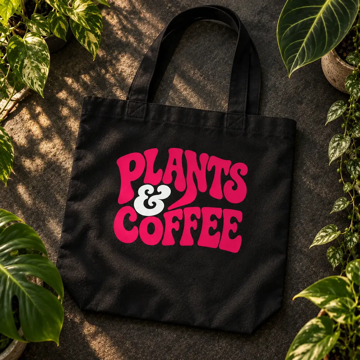 Black tote bag with Plants and Coffee in hot pink