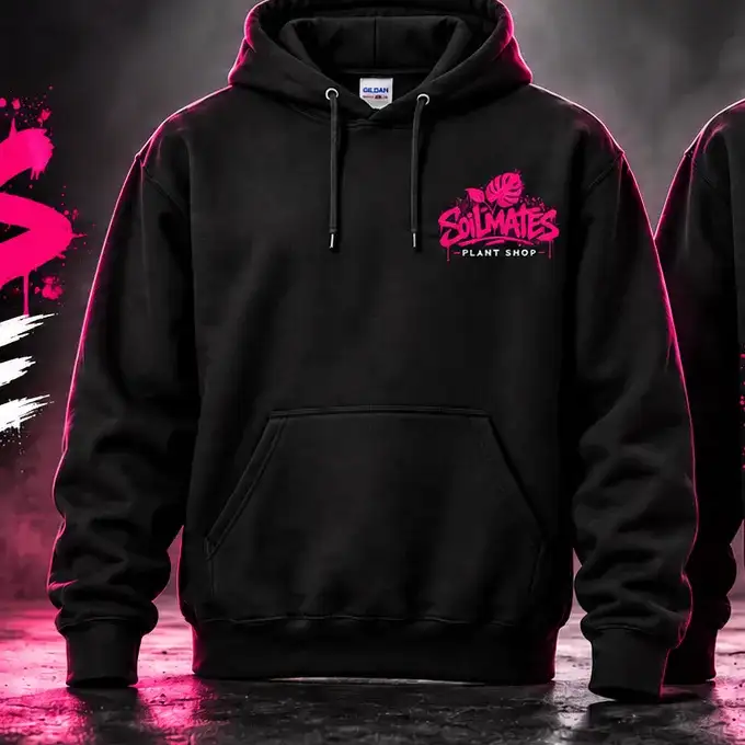 Front of the black SOILMATES Street Hoodie: a small hot pink SOILMATES Plant Shop logo on the chest